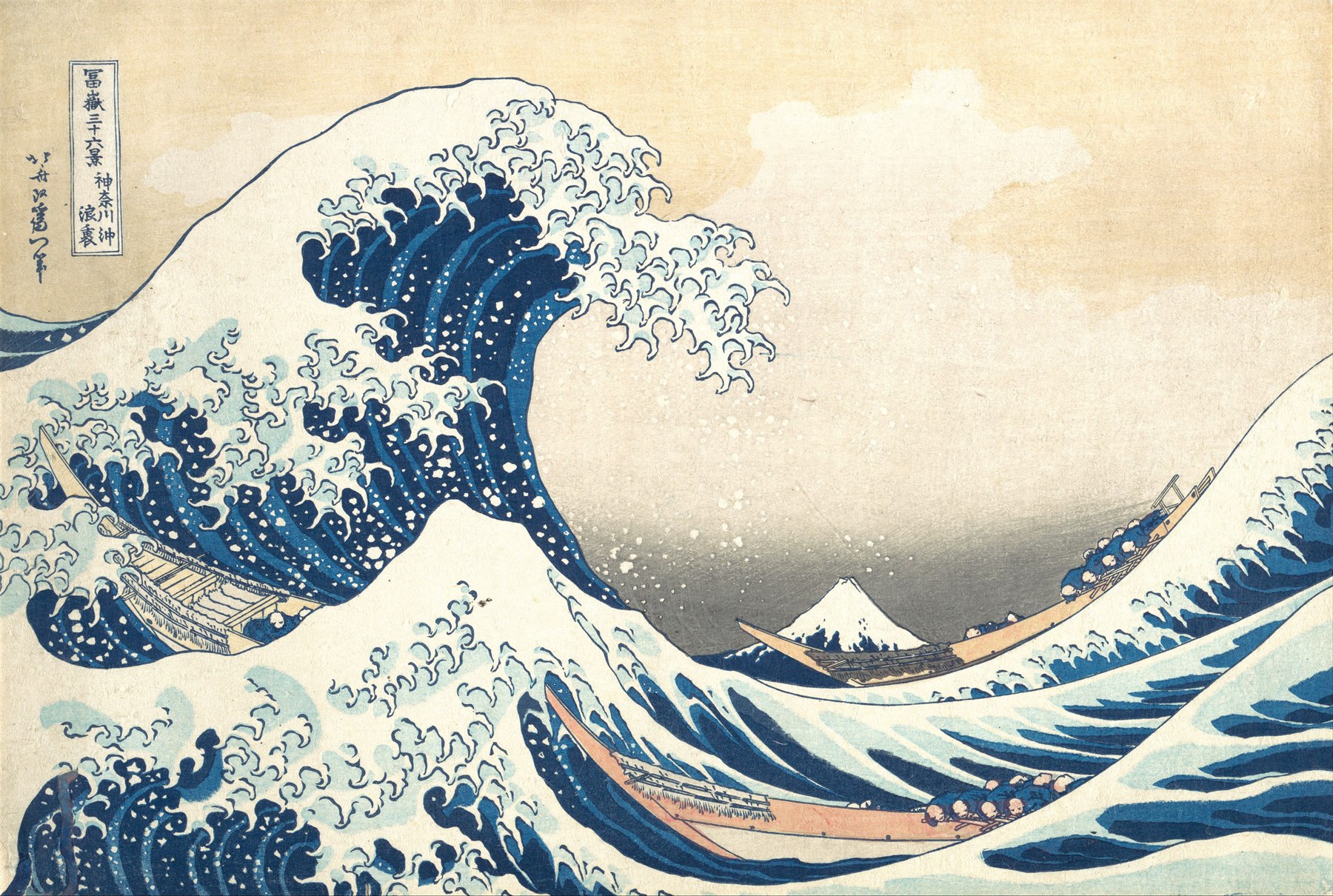 A great blue wave rises above boats with Mount Fuji visible in the distance in a print by Katsushika Hokusai.